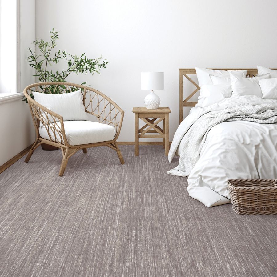 carpet in bedroom with furniture and white comforters 